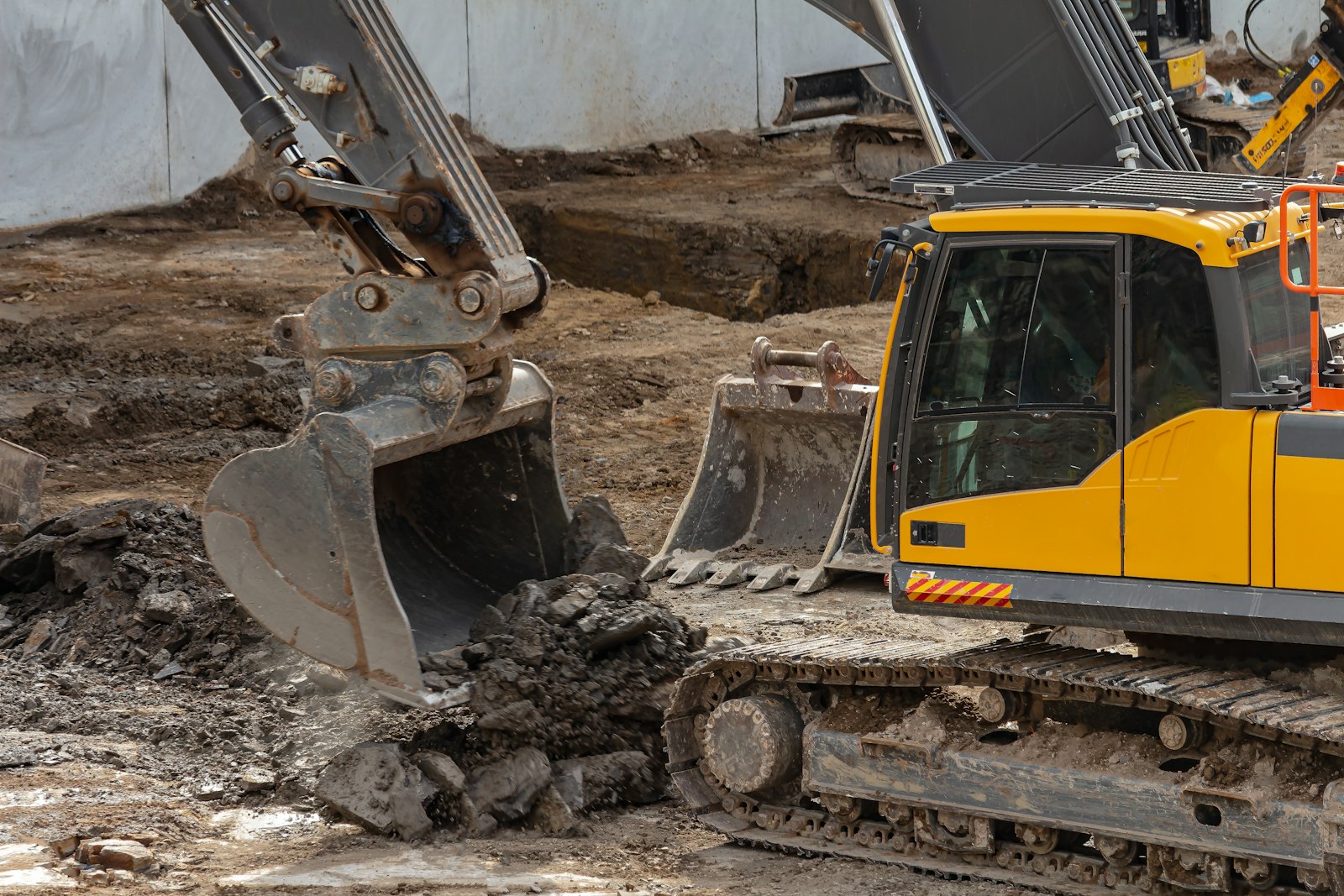 Excavator moving soil on a construction site in Queensland — ReadyFill